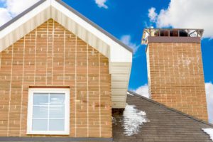 masonry home with brick chimney and chimney cap on top masonry home with brick chimney and chimney cap on top